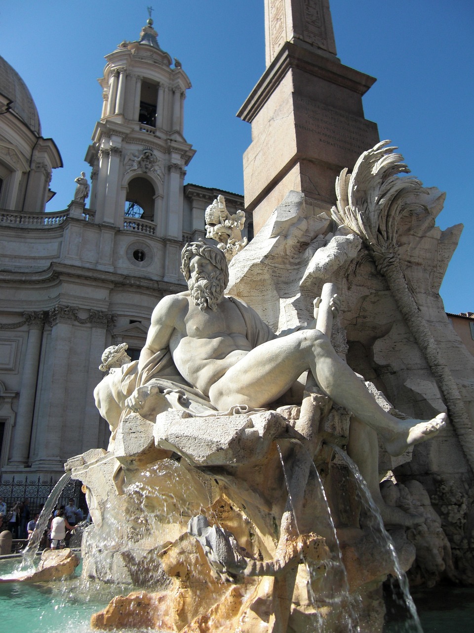 Fontana dei 4 fiumi in piazza Navona in Rome. Personifying the 4 major rivers of the world with more than human-sized statues